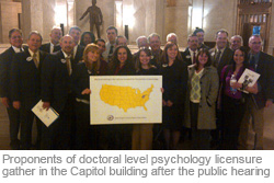 Proponents of doctoral level psychology licensure gather in the Capitol building after the public hearing 
