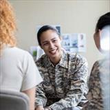 Military members in a group meeting