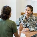 Two military members meeting